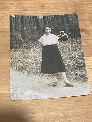 1960s Girl in a skirt Shoes Legs Short haircut Vintage photo Soviet photo
