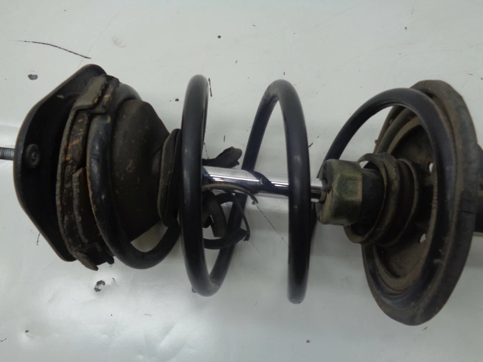 Amortiguador delantero izquierdo Toyota Prius 2001-2003 muelle puntal OEM AK210572 Foto 2 de 4