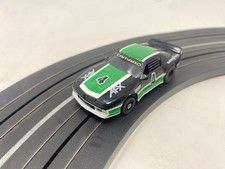 Aurora AFX Black Green Chevy Camaro 4 HO Slot Car Excellent Condition