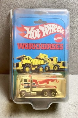 Hot Wheels Vintage 1983 Workhorses Steve's 24 - Bulldozer CAT échelle 1:64 - Malaisie