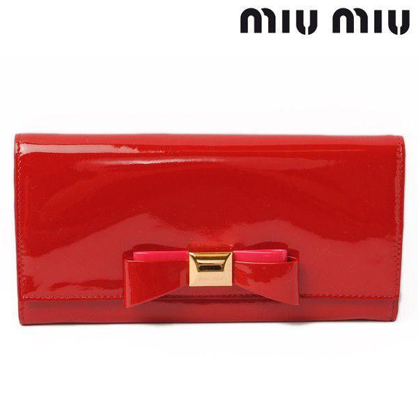 MiuMiu レザー ピンウィールブローチ レッド　ホワイト レッド/ホワイト レザー ピンウィールブローチ | Miu Miu