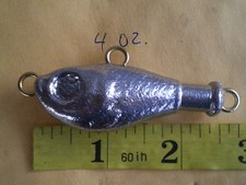 25 PCS. FISH HEAD RIG, FLUKE JIG LURE, 4 OZ.  WITH 3 EYES, UNPAINTED