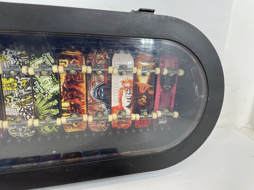 Lote de tableros Tech Deck con algunos accesorios y vitrina de almacenamiento Foto 4 de 4