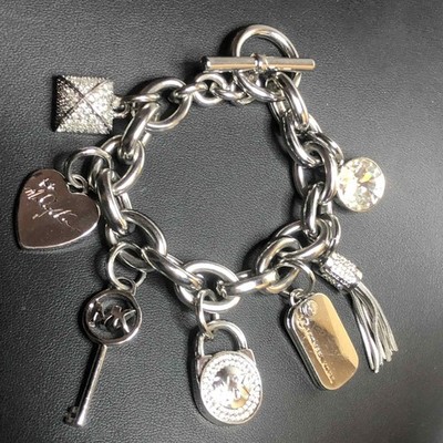 6324 Michael Kors silvertone Crystal Key tassl MK logo charm Bracelet Toggle 8''