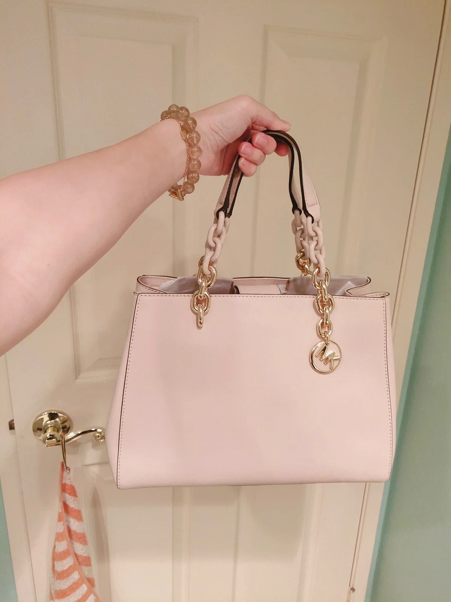 Pink Michael Kors bag. Like new. Sold as is.