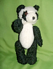 Hugfun 9" made in 1998 . This Panda Bear is Fully Jointed and was sold by Costco