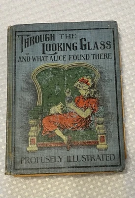 RARE 1st Edit.Through The Looking Glass And What Alice Found There.L.Caroll 1871 - Image 1 of 4