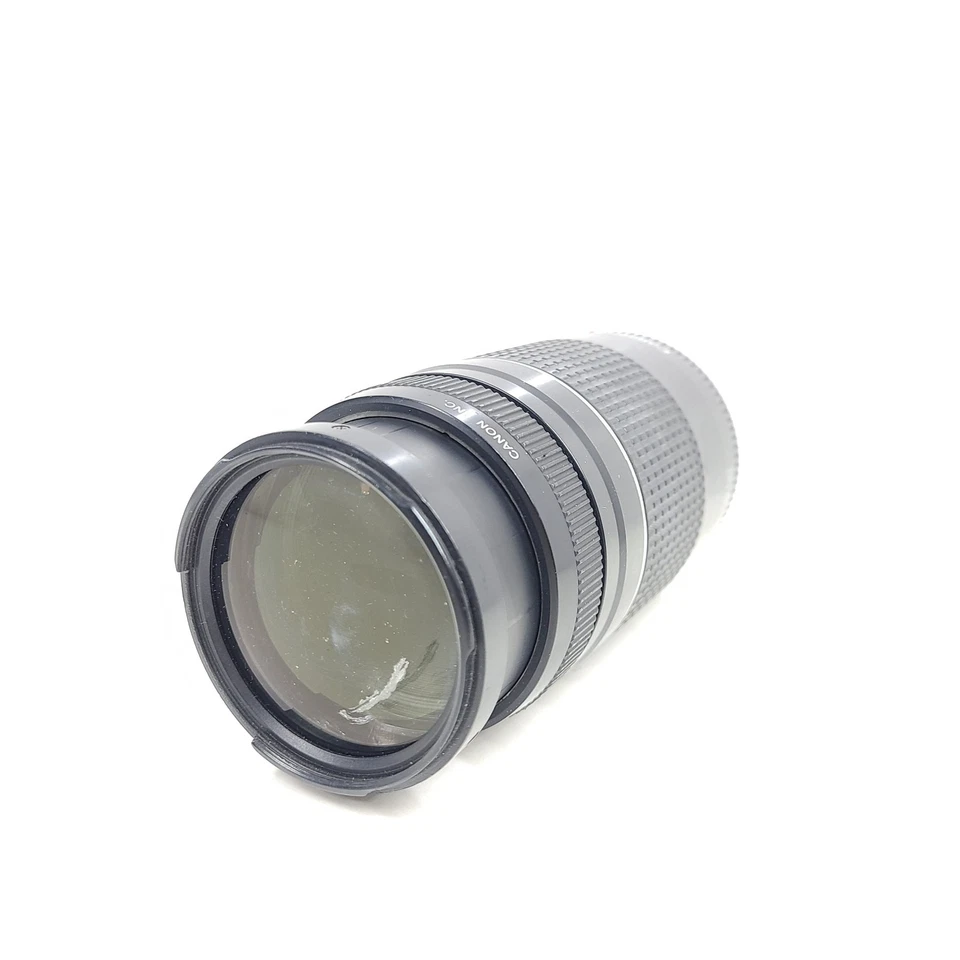 Lente Nikon AF Nikkor 75-300 mm f/4,5-5,6 - DEFECTO LEER ARAÑAZOS Foto 3 de 4