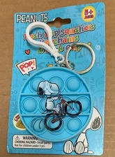Push Pop Squishies Squishers Snoopy Bike Keychain backpack clip Peanuts Bicycle