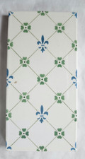 CHARMING 6 X 3 INCH BORDER TILE.  LATE 19TH CENTURY. STENCILLED GOTHIC DESIGN