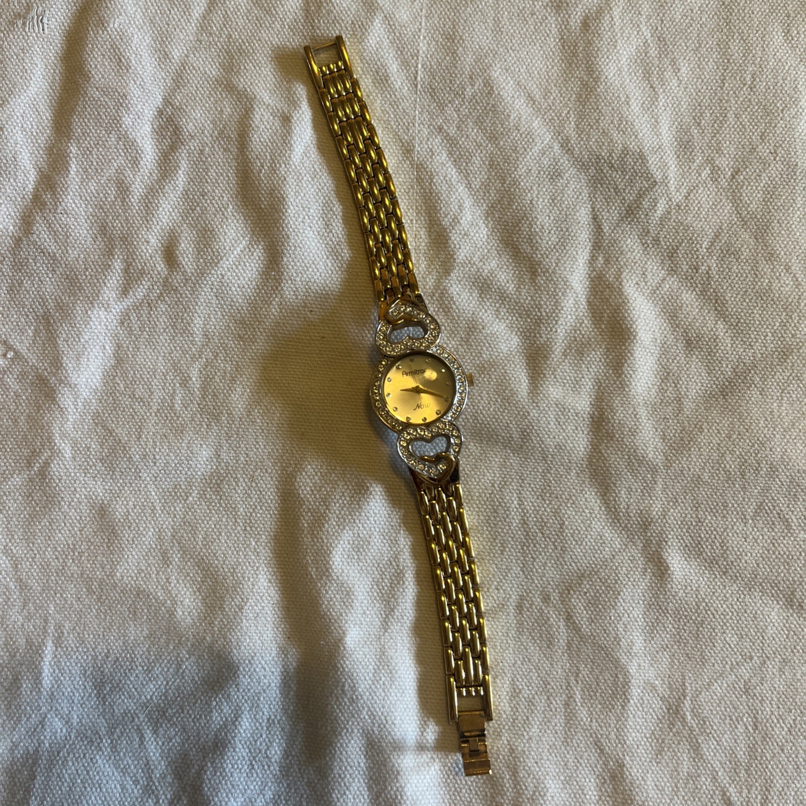 Armitron “Now” Gold-Tone Bracelet Watch – Rhinestone Hearts Accent
