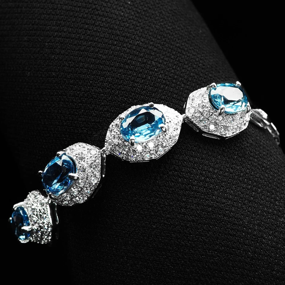 Bracciali in oro bianco con topazio blu svizzero radiante ovale in argento... - Immagine 2 di 4