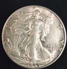 LOT # 1100    1942-D  WALKING LIBERTY HALF DOLLAR (HI-GRADE)