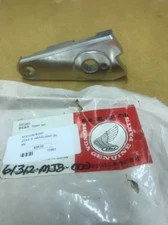 NOS OEM Honda Headlight Stay, R.  Part #61312-MJ8-000 VF500C