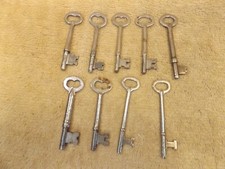 Lot of 9 Vintage solid barrel SKELETON KEYS
