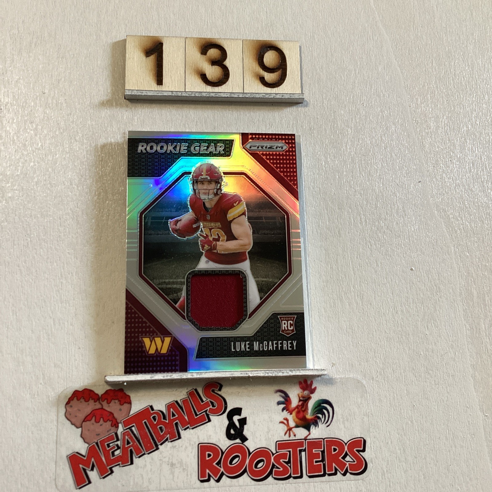 2024 Panini Prizm - Rookie Gear Luke McCaffrey #RG-LMY Silver Prizm