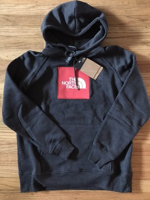 black jacket with red patch