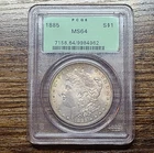 1885 Morgan Silver Dollar PCGS MS64 OGH Philadelphia Mint Gold Toner
