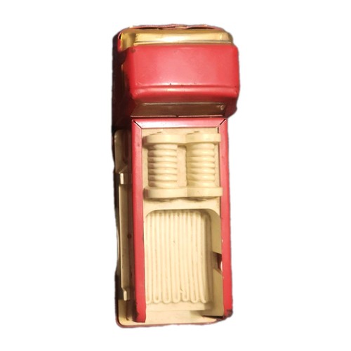 Red vintage 1970s Tonka No. 6 pressed steel fire engine with gold accents and beige spring suspension detail.