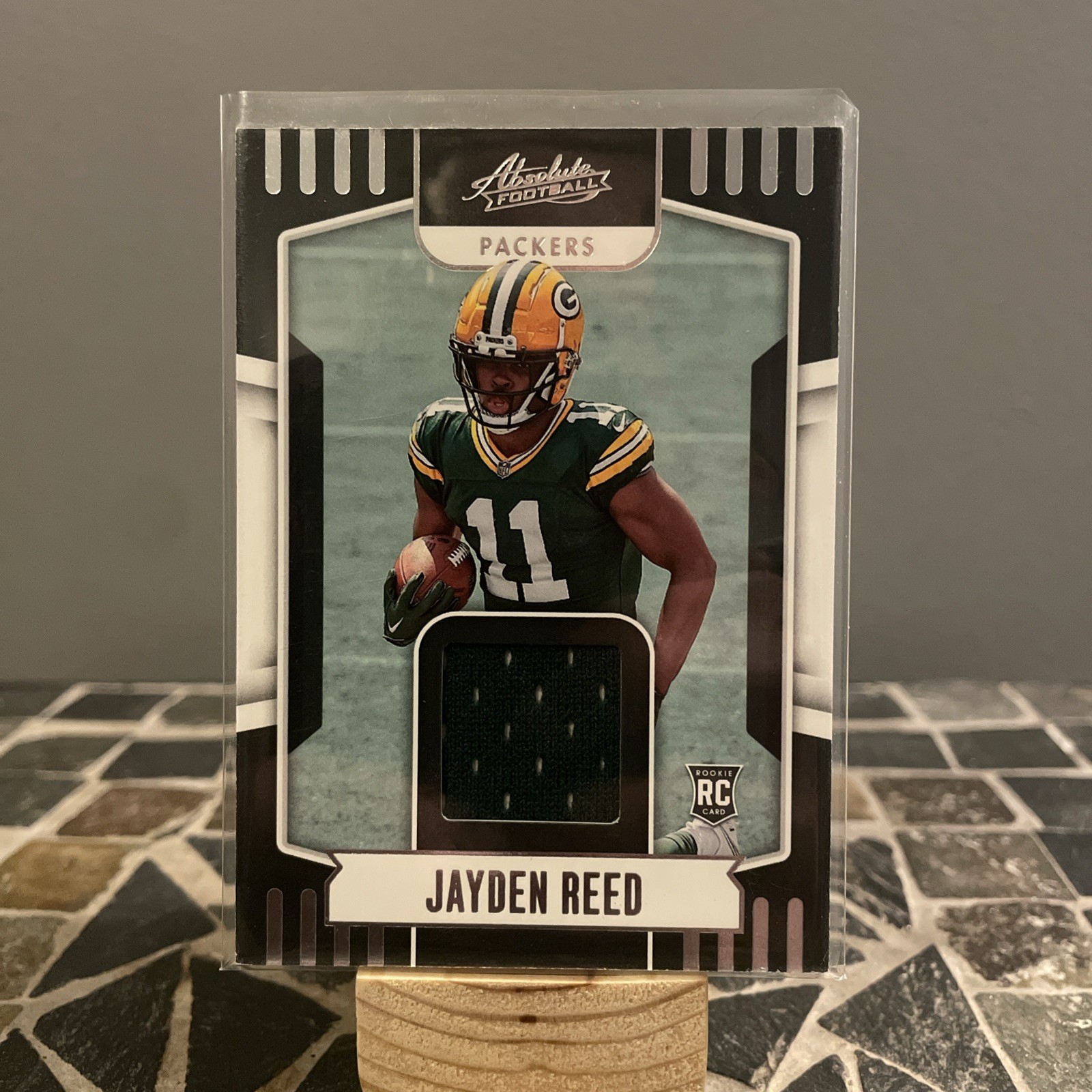 2023 Panini Absolute - Absolute Rookie Materials #ARM-15 Jayden Reed (MEM, RC)