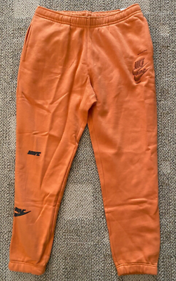 nike men's sportswear club fleece orange joggers