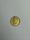 Photo of a 1861-P Gold Dollar from an eBay listing that sold on May 15, 2026