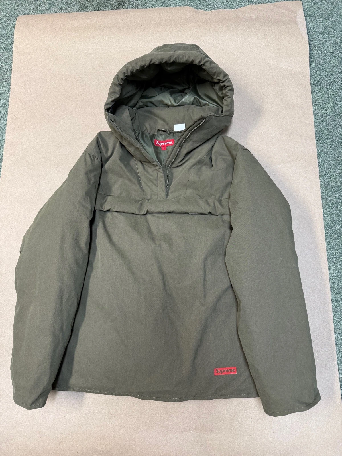 Pull Supreme à capuche en duvet olive   Taille S
