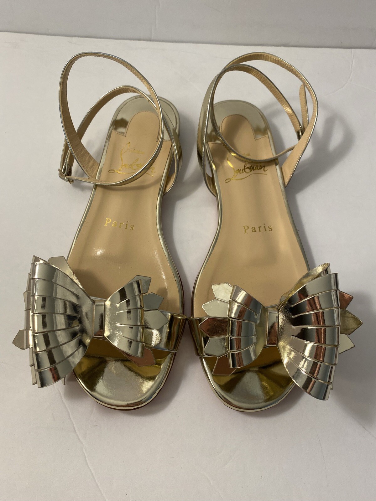 gold strap louboutin