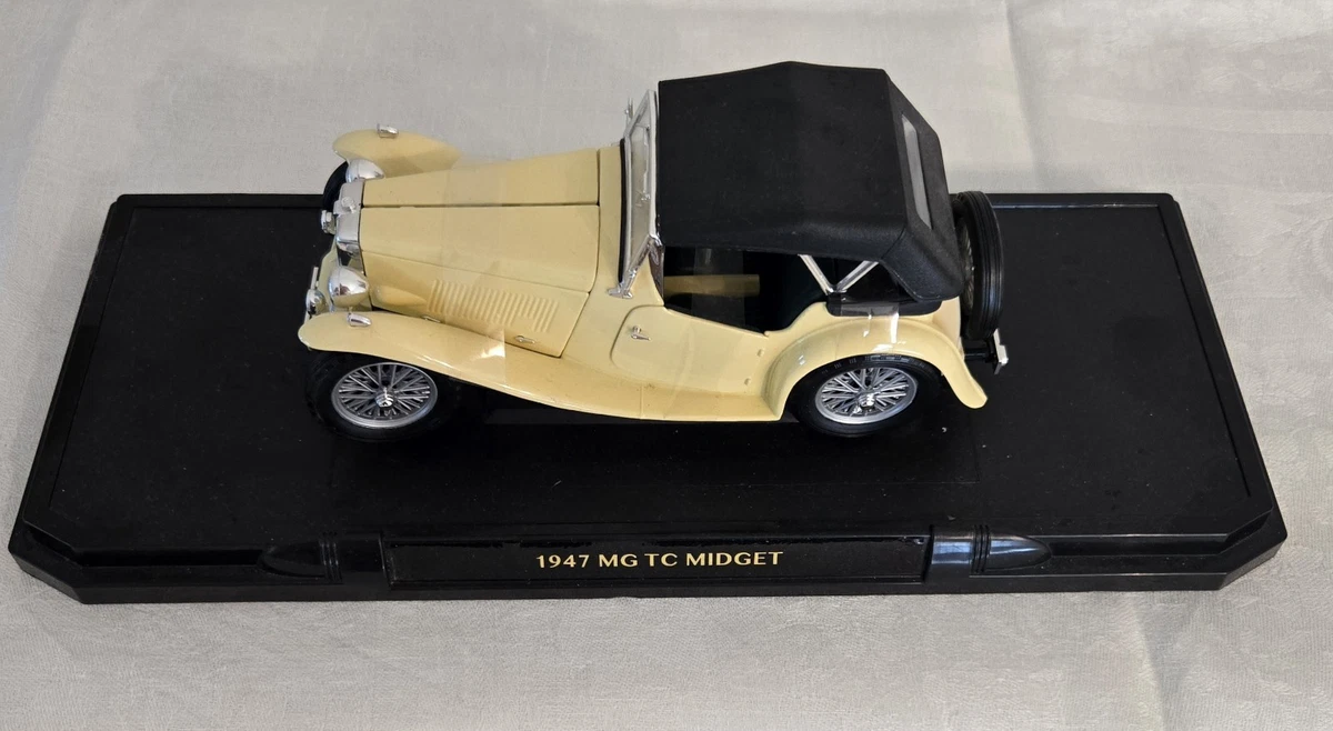 Diecast model cars MG TC 1/18 Yat Ming Midget green RHD 1947 Verdeck couché avec
