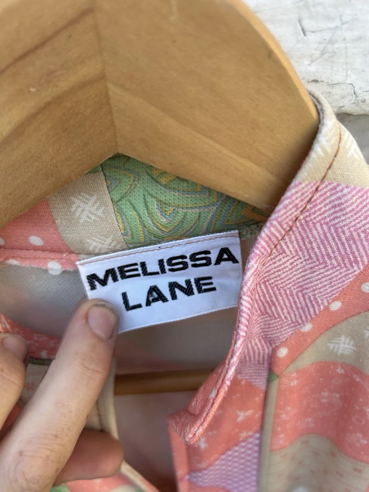 Mono vintage años 70’s para mujer con estampado de novedad hippy discoteca sin mangas  Foto 2 de 4