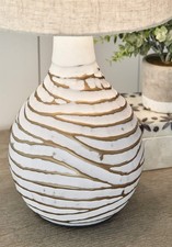 Signature Design by Ashley Aleela Metal Table Lamp in White and Gold