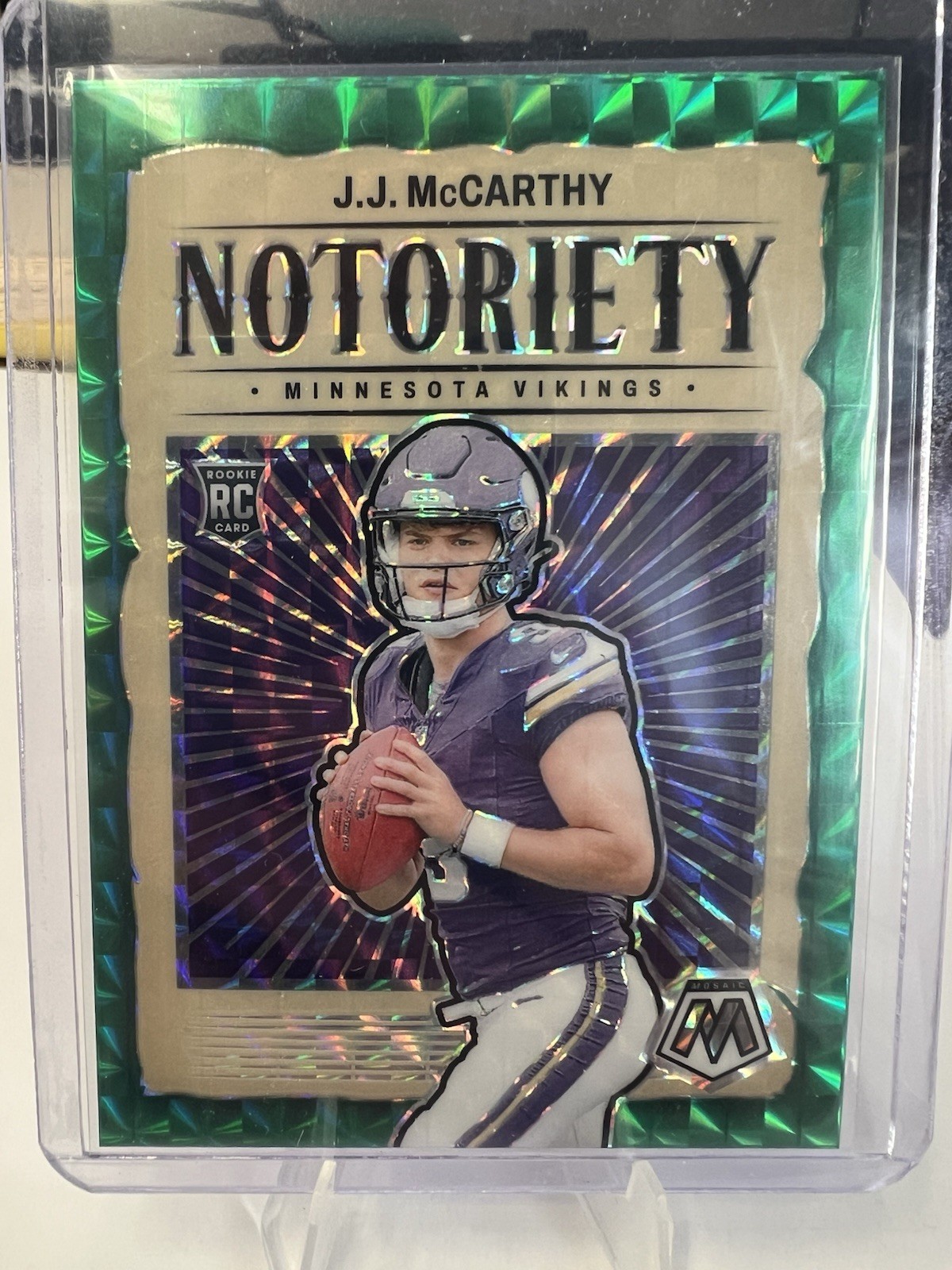 2024 Mosaic JJ McCarthy Green Prizm Notoriety RC Rookie #21 Vikings