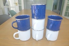 Classic enamel steel mugs.Blue and white with stainless steel rim.