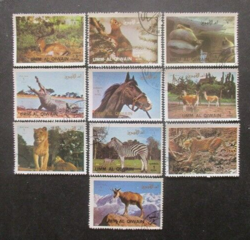 Umm Al Qiwain 10 Obliterated WILD ANIMALS Stamps - Picture 1 of 1