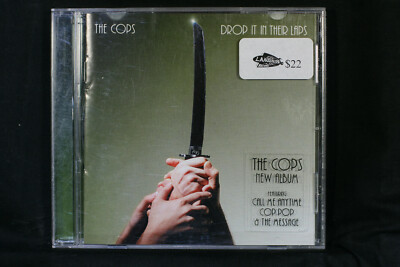 The Cops    Drop It In Their Laps   - CD (C845)