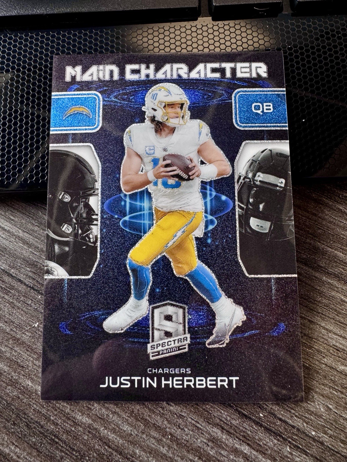 2023 Spectra Football Casehit Justin Herbert Main Character Prizm Case Hit SSP