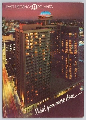Hyatt Regency Atlanta GA Postcard 1984 Olympic Stamp Cityscape Night View