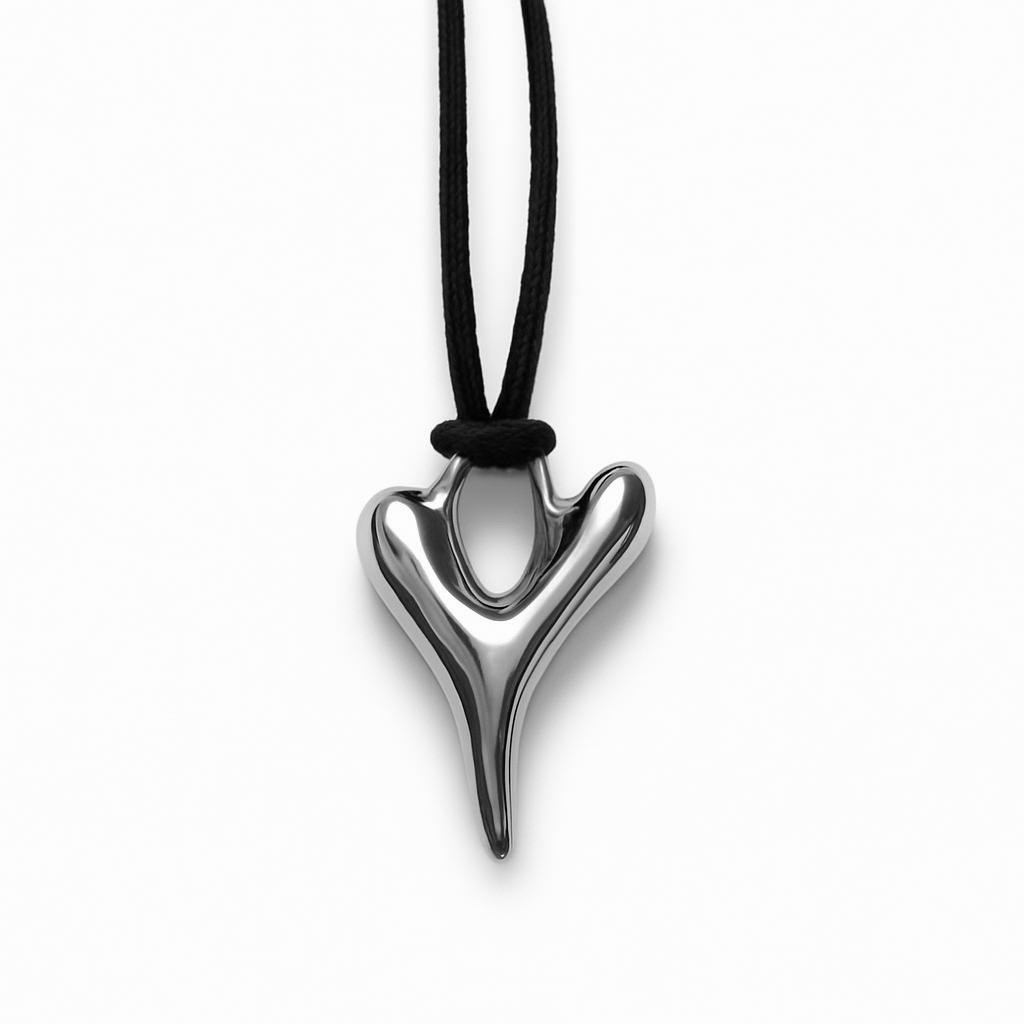 RARE - ROBERT LEE MORRIS STERLING SILVER TWISTED HEART PENDANT