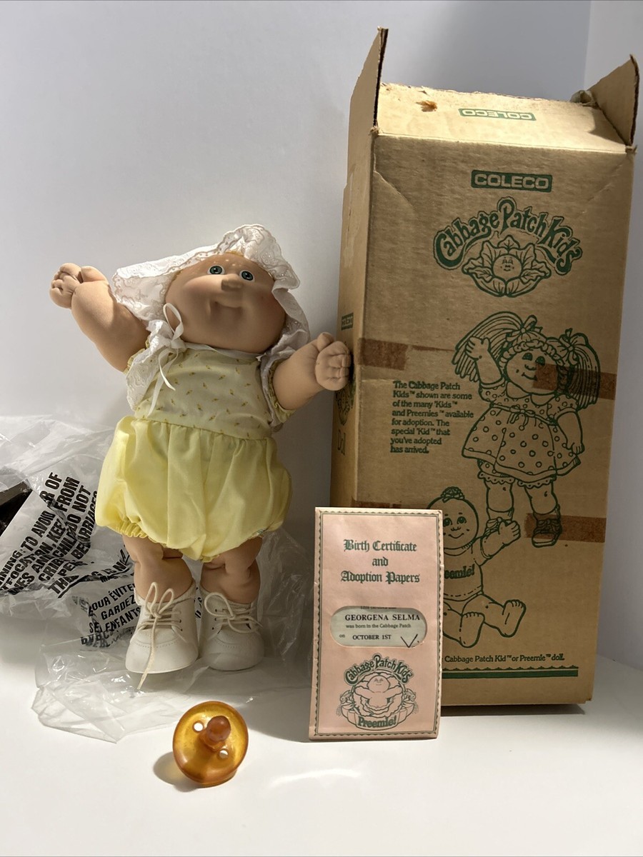 Cabbage patch kids 1984 preemie doll with birth cert and box, green eyes  Blond