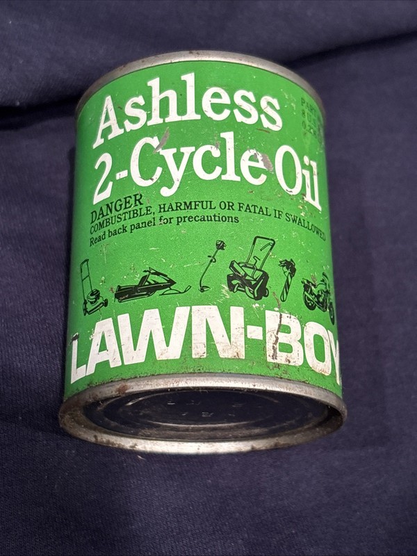 Vintage lawn boy two cycle 8 ounce snowmobile, chainsaw￼steel oil can