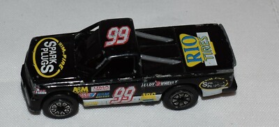 Black #99 Rio Tires Rim-Fire Spark Plugs Race Car, Made in China