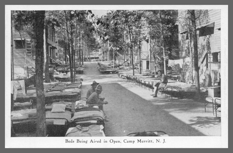 Beds being aired in open, Camp Merritt, N.J. Unposted postcard