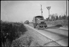 WW2 Photo Negative of Army Cargo Trucks Advancing in Highway Convoy
