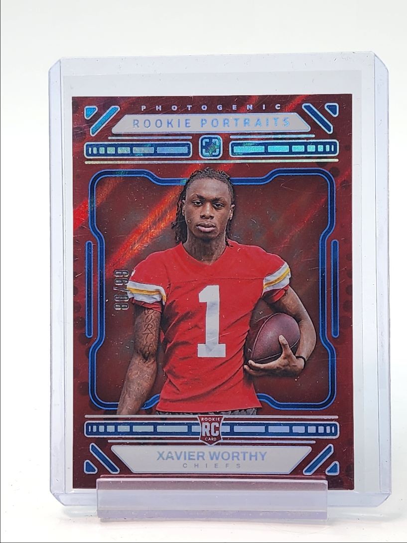 XAVIER WORTHY 2024 PHOTOGENIC ROOKIE PORTRAITS BLUE CHIEFS RC /99 Q4081