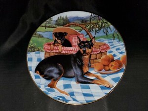 The Danbury Mint The Collection Entitled Miniature Pinchers Family Picnic Plate