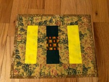 Quilted Table topper or wall hanging, green, yellow, 14 x 11.5 new, polyester
