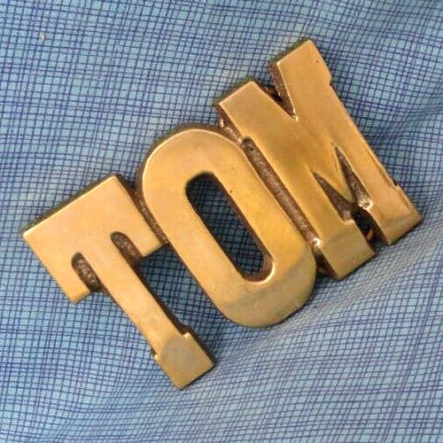 TOM Belt Buckle Iconic 80s Cut Out Brass Name Vintage Taiwan .SHY108 - Picture 1 of 8