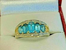 4.20Ct Emerald Cut Blue Topaz Five Stone Engagement Ring 14K Yellow Gold Finish