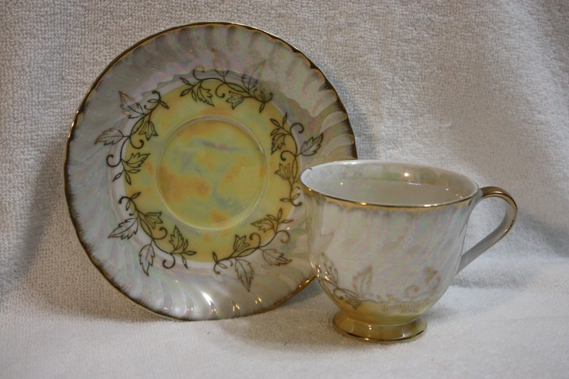 Vintage Lusterware Yellow and White Footed Teacup and Saucer