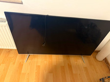 Flachbildfernseher / TV in Schwarz mit Standfüßen, Fernseher & Monitor-Display